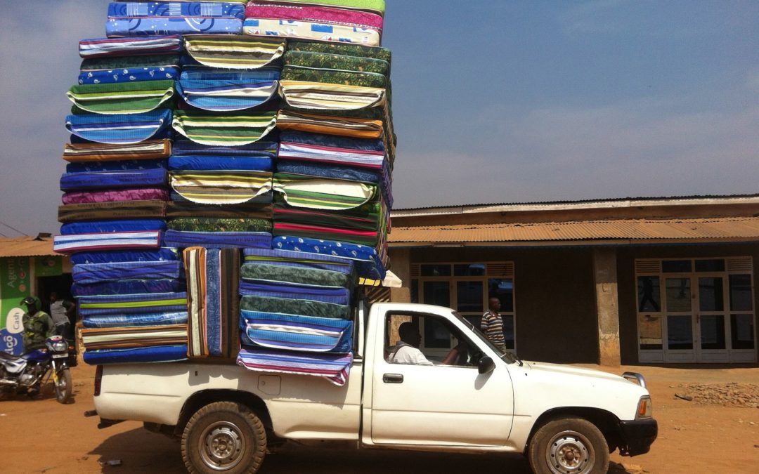 A truck with 50 mattresses in its bed